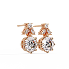 Elegant floral-inspired diamond drop earrings featuring round and marquise-cut stones for exceptional brilliance.