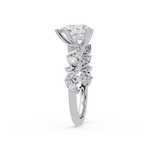 Nature-Inspired Pear Diamond Engagement Ring with Marquise & Round Accent Stones