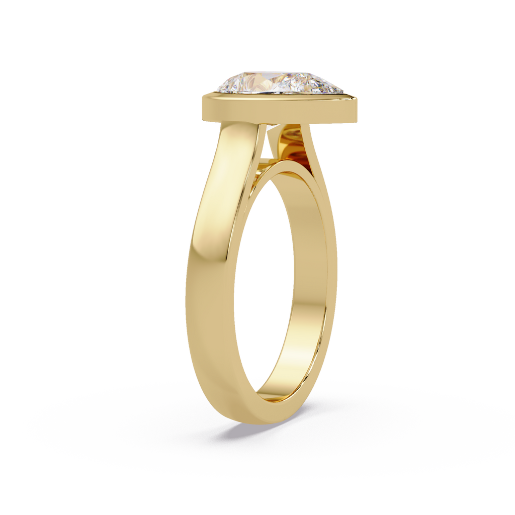 Modern Bezel Set Pear Cut Diamond Ring