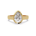 Modern Bezel Set Pear Cut Diamond Ring