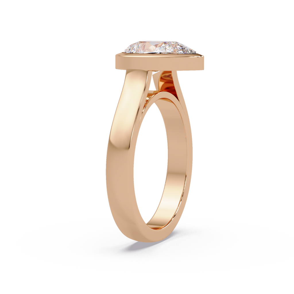 Modern Bezel Set Pear Cut Diamond Ring