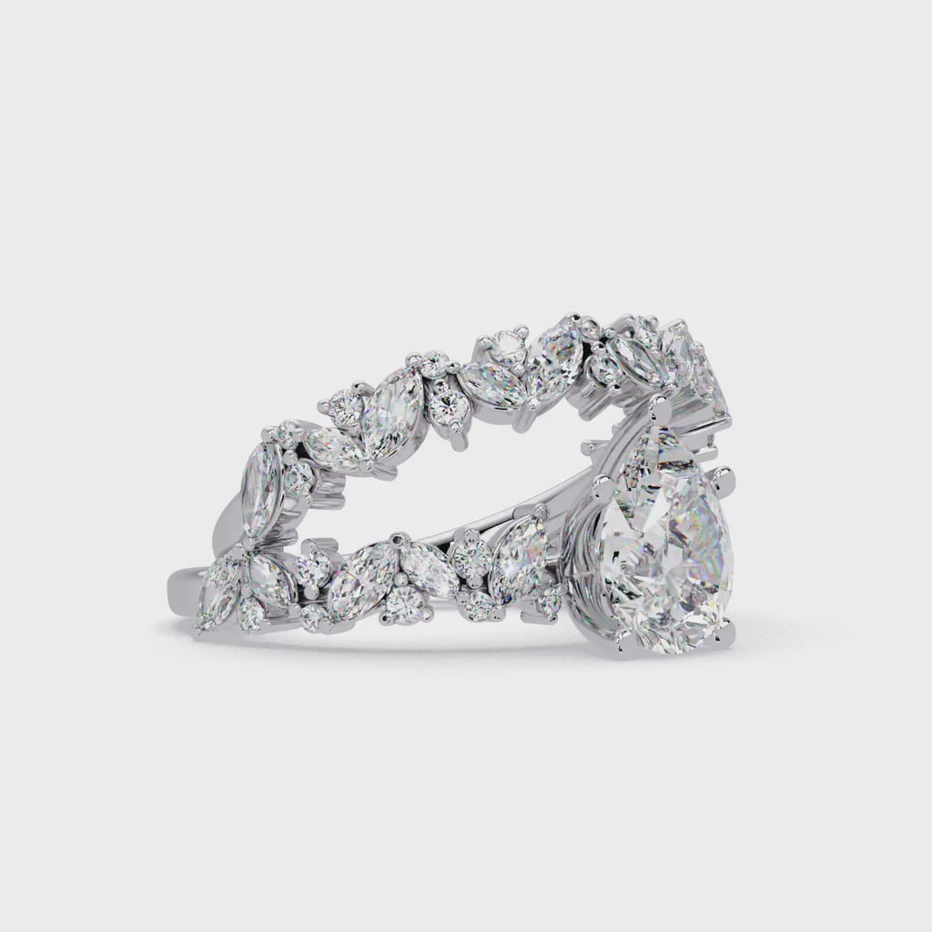 Nature-Inspired Pear Diamond Engagement Ring with Marquise & Round Accent Stones