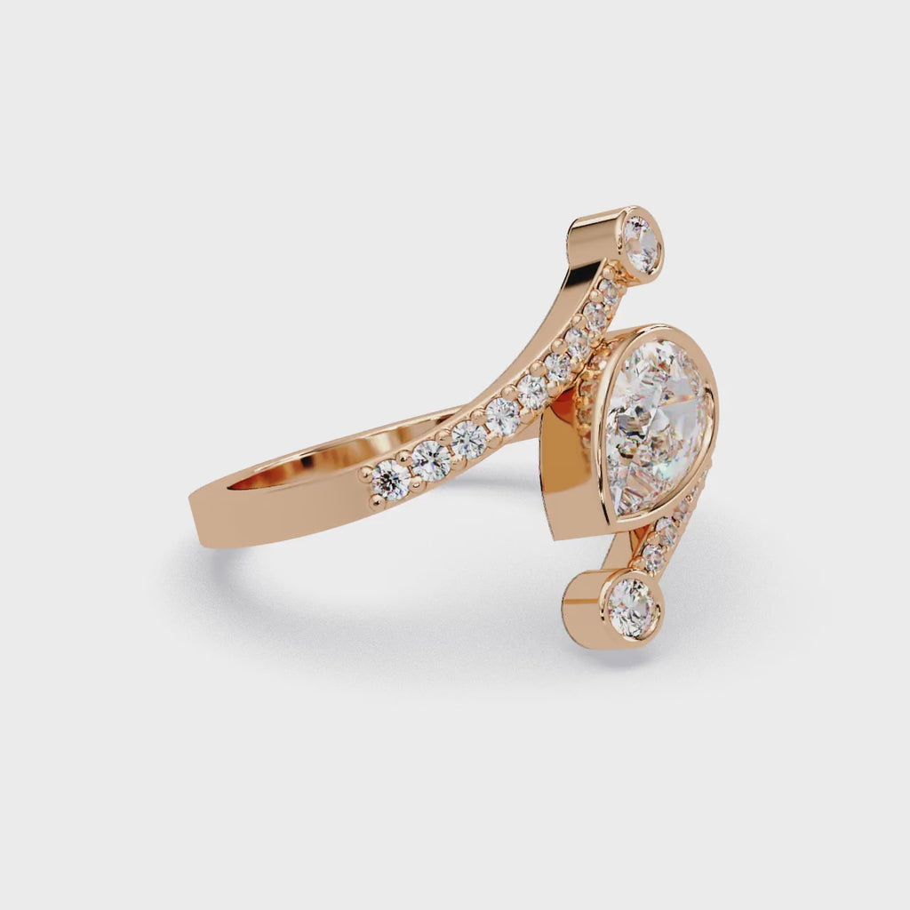 Modern Bezel Set Pear Diamond Bypass Engagement Ring