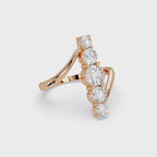 Round Cut Graduated Diamond Open Bypass Ring in Gold