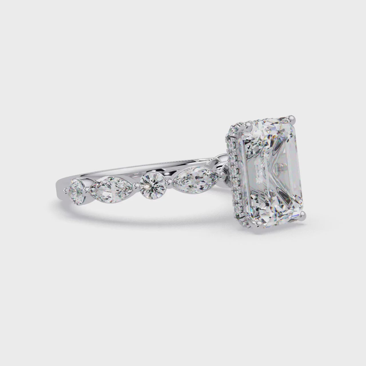 Modern East-West Emerald Solitaire Hidden Halo Ring