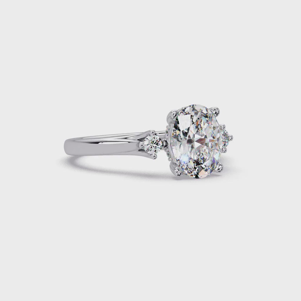 Oval Cut Diamond Three Stone Hidden Halo Engagement Ring