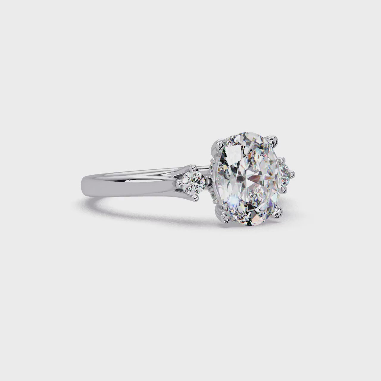 Oval Cut Diamond Three Stone Hidden Halo Engagement Ring