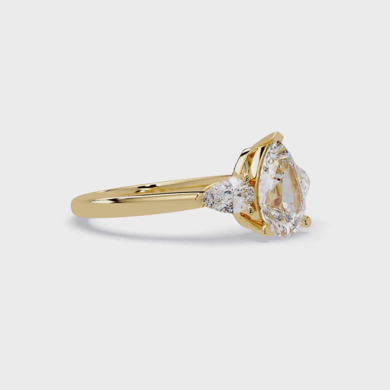 Pear-Shaped Three-Stone Diamond Engagement Ring