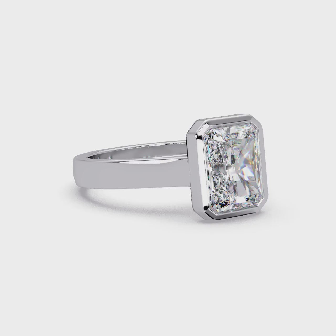 Modern Bezel Set Radiant Cut Diamond Ring