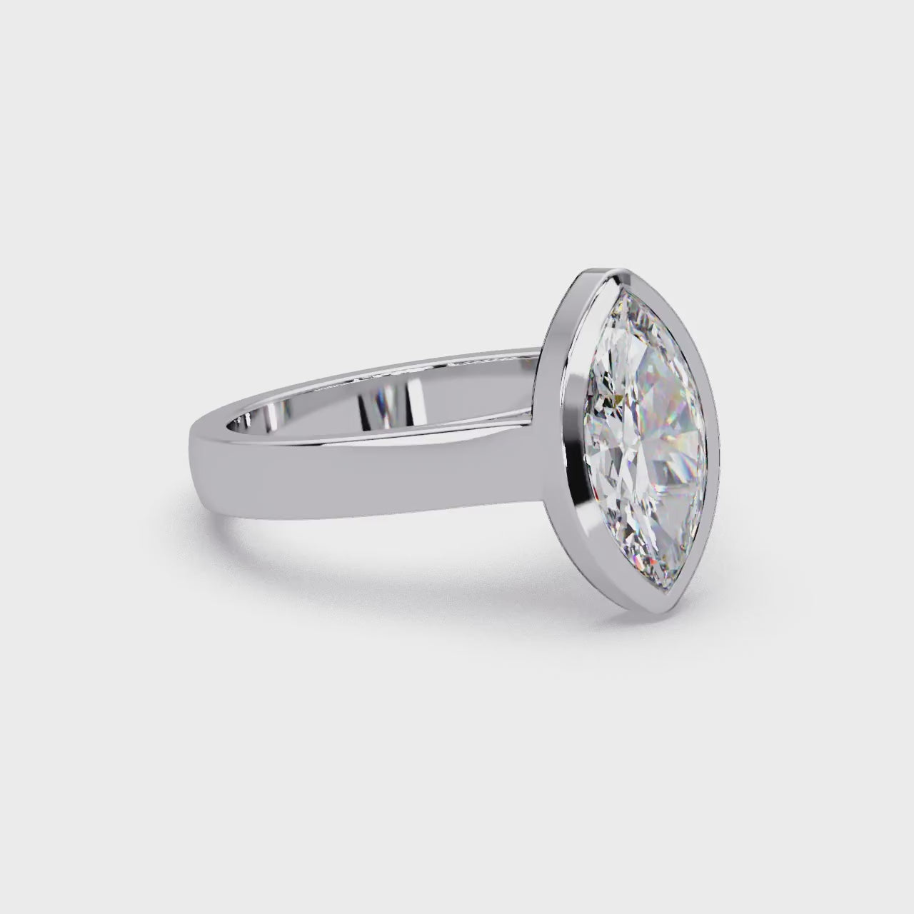 Modern Bezel Set Marquise Cut Diamond Rin