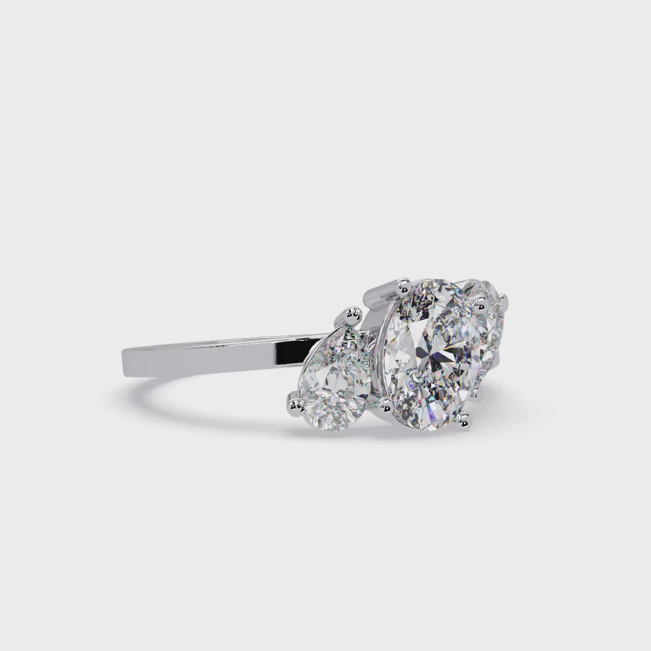 Oval & Pear Three Stone Diamond Engagement Ring