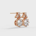 Elegant floral-inspired diamond drop earrings featuring round and marquise-cut stones for exceptional brilliance.