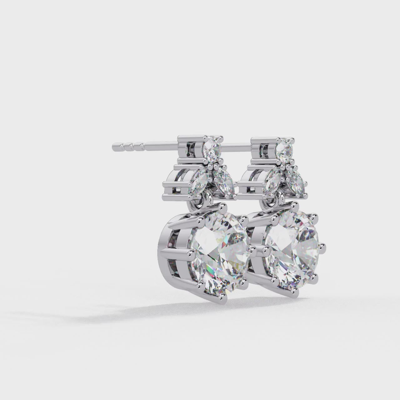 Elegant floral-inspired diamond drop earrings featuring round and marquise-cut stones for exceptional brilliance.