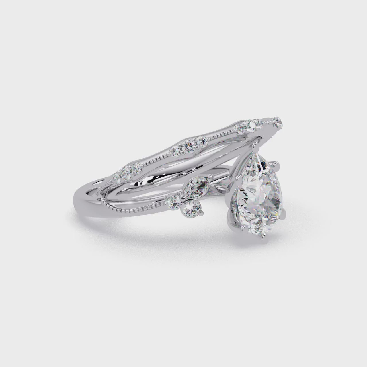 Heart Cut Diamond Ring with Round, Pear & Marquise Accent Stones