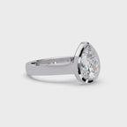 Modern Bezel Set Pear Cut Diamond Ring